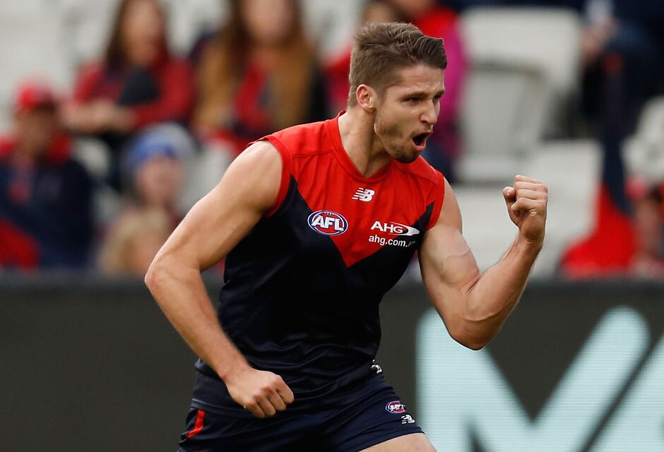 AFL 2016 Rd 15 - Melbourne v Adelaide MELBOURNE, AUSTRALIA - JULY 03: Jesse Hogan of the Demons celebrates a goal during the 2016 AFL Round 15 match between the Melbourne Demons and the Adelaide Crows at the Melbourne Cricket Ground on July 3, 2016 in Melbourne, Australia. (Photo by Michael Willson/AFL Media)